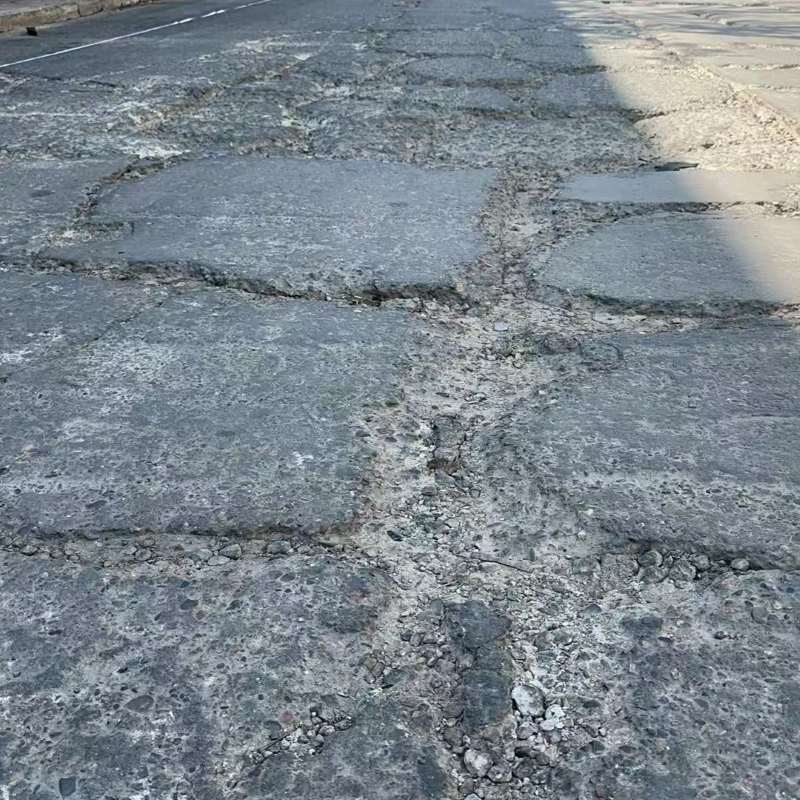 嘉荫路面起砂露石子修补料